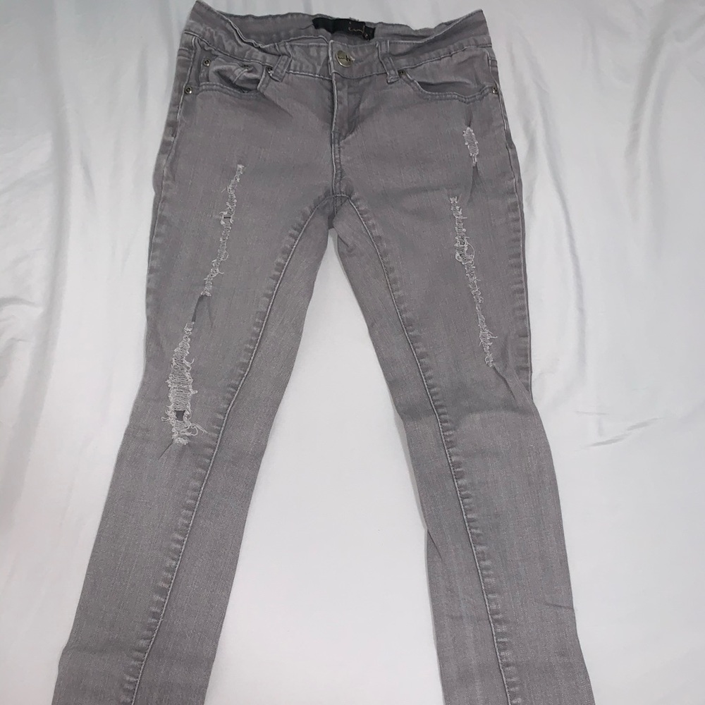 Grey ripped jeans